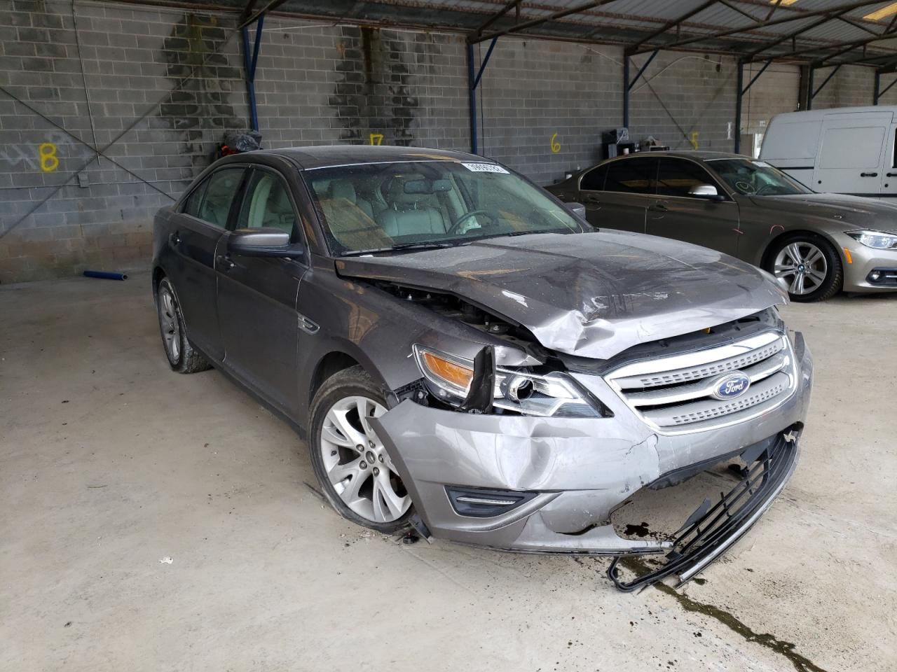 FORD TAURUS SEL 2011 with VIN 1FAHP2EW4BG186391 - Photo from auction