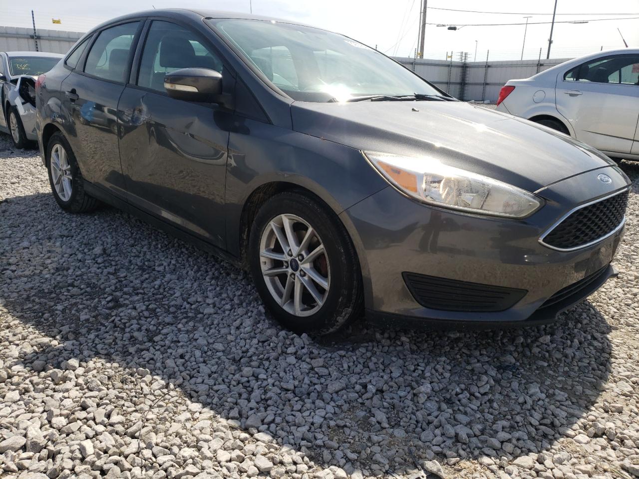 FORD FOCUS SE 2016 with VIN 1FADP3F26GL276544 - Photo from auction