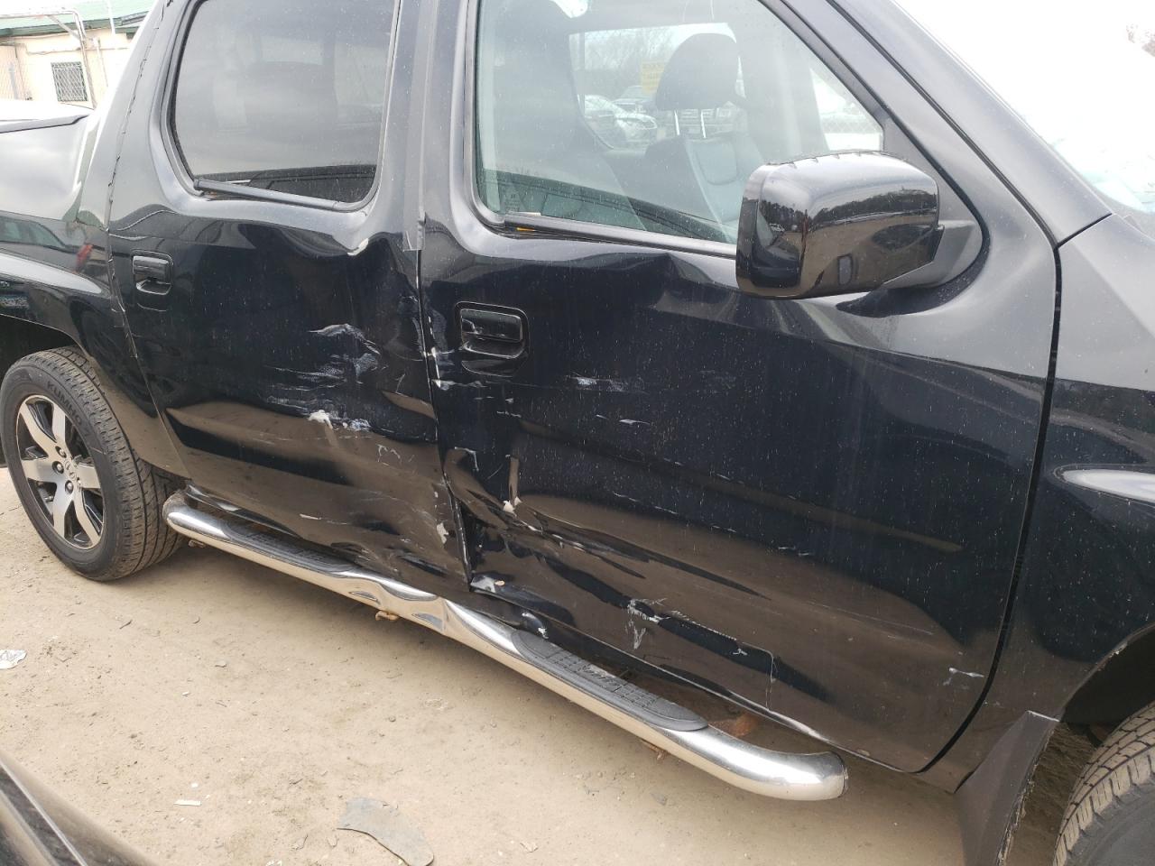 Photo 9 from auction – 2014 HONDA RIDGELINE with VIN 5FPYK1F66EB011860