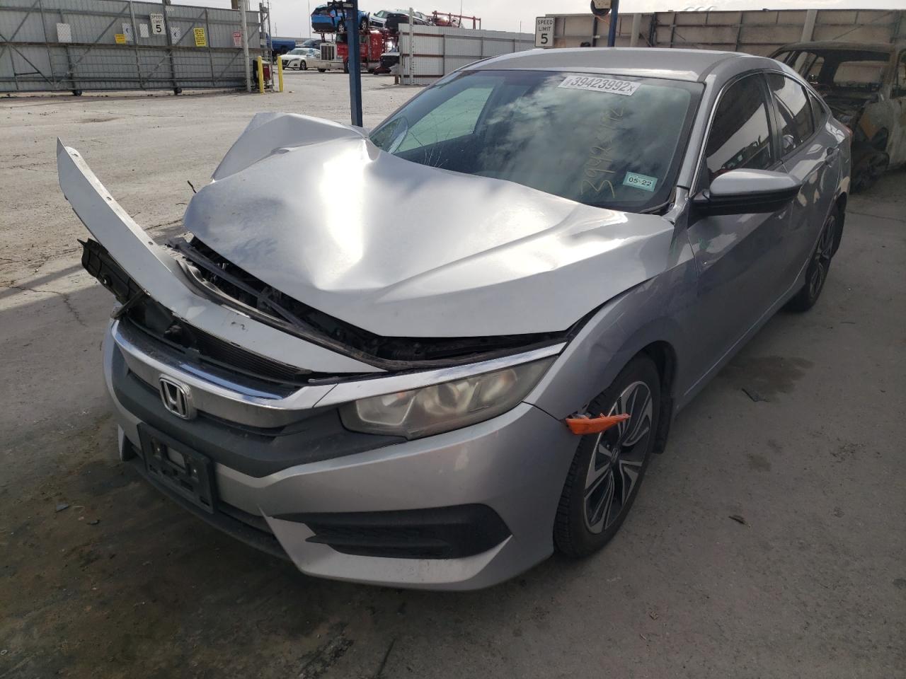 Photo 2 from auction – 2016 HONDA CIVIC LX with VIN 19XFC2F58GE032485