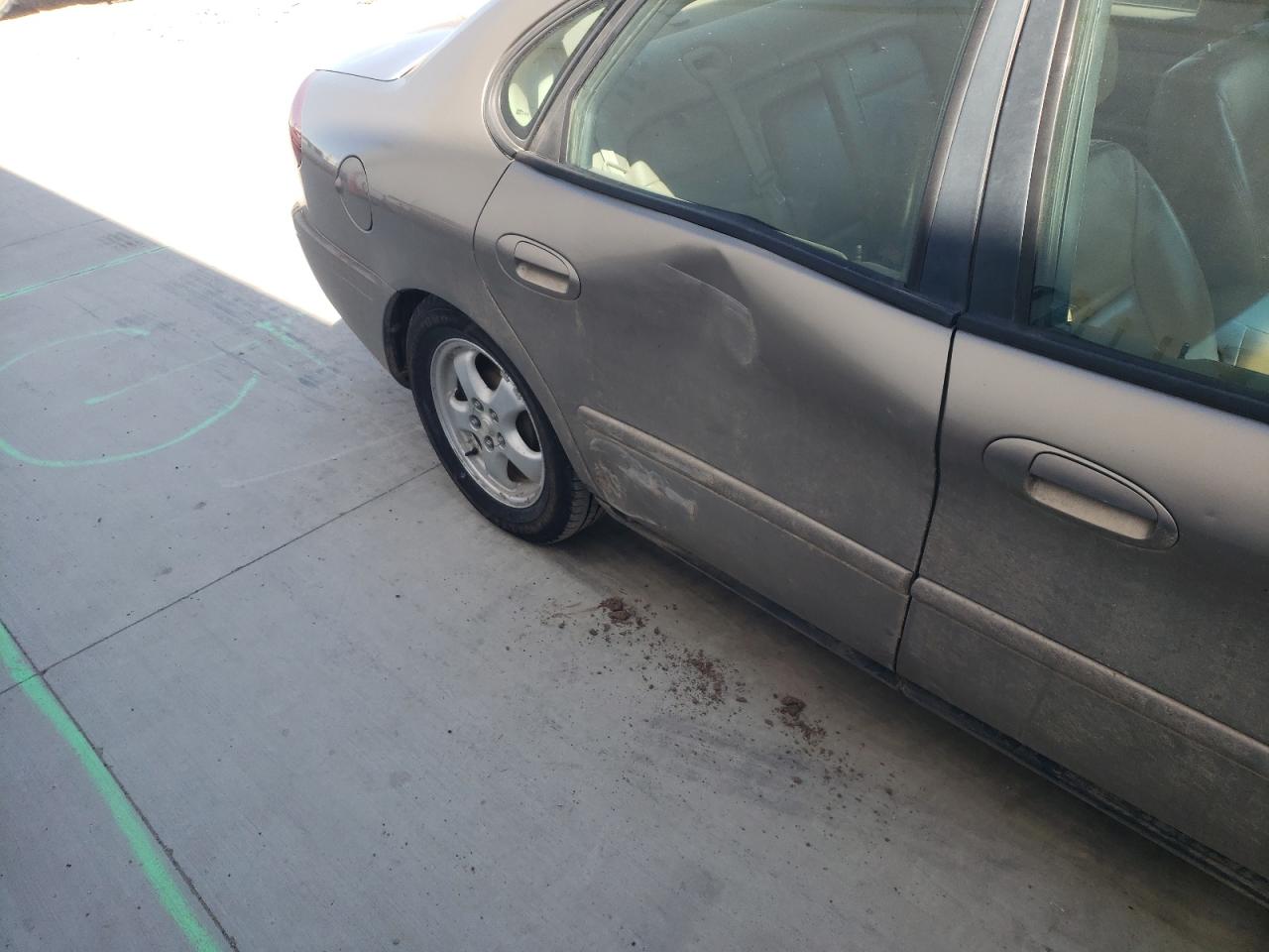 Photo 9 from auction – 2004 FORD TAURUS SES with VIN 1FAFP55S54G200405