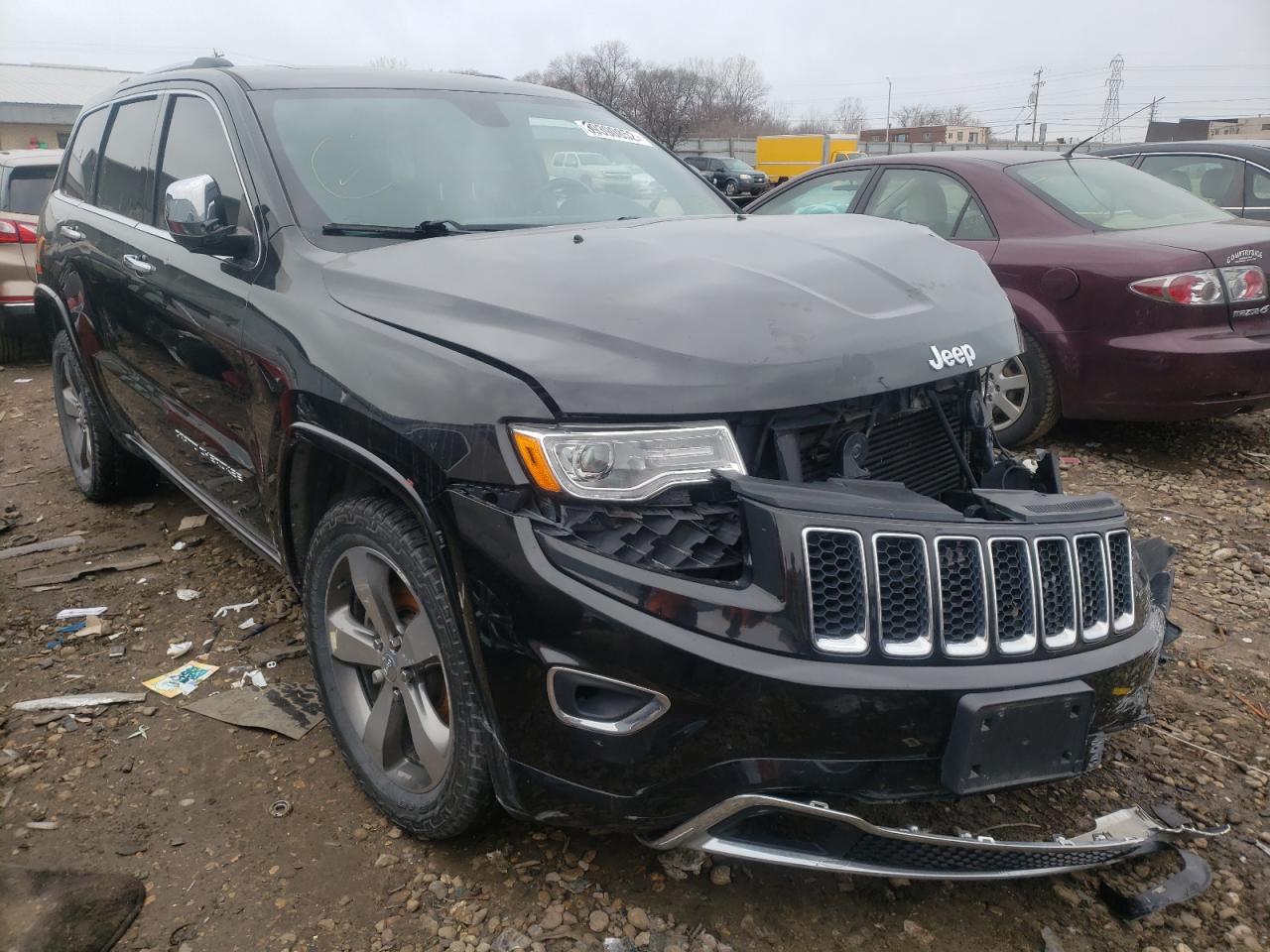 JEEP GRAND CHER 2015 with VIN 1C4RJFCM2FC878168 - Photo from auction