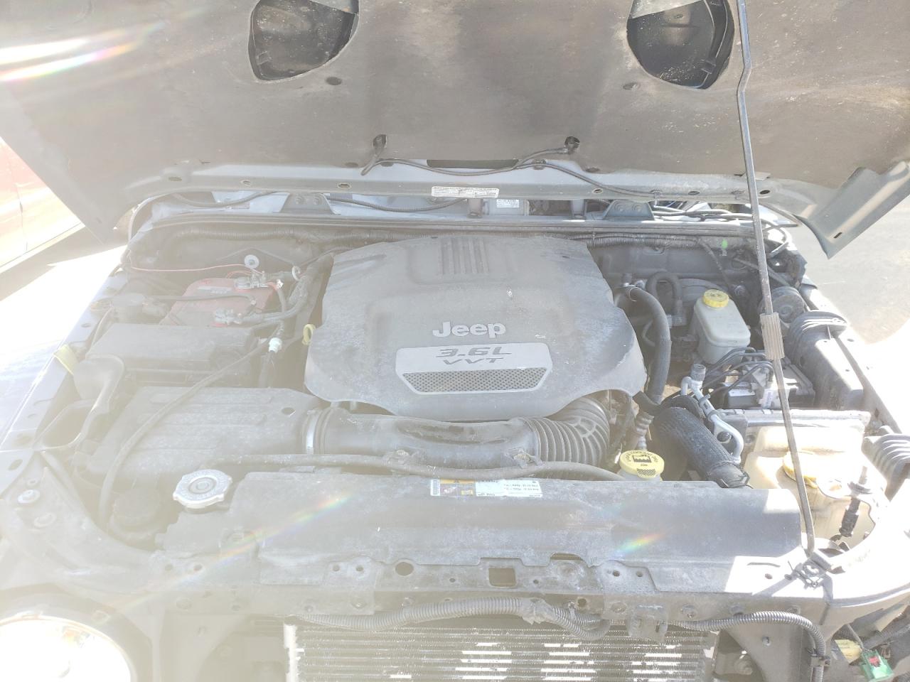 Photo 7 from auction – 2013 JEEP WRANGLER U with VIN 1C4BJWFG8DL703055