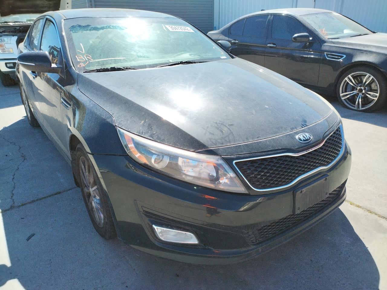 KIA OPTIMA EX 2015 with VIN 5XXGN4A77FG392050 - Photo from auction