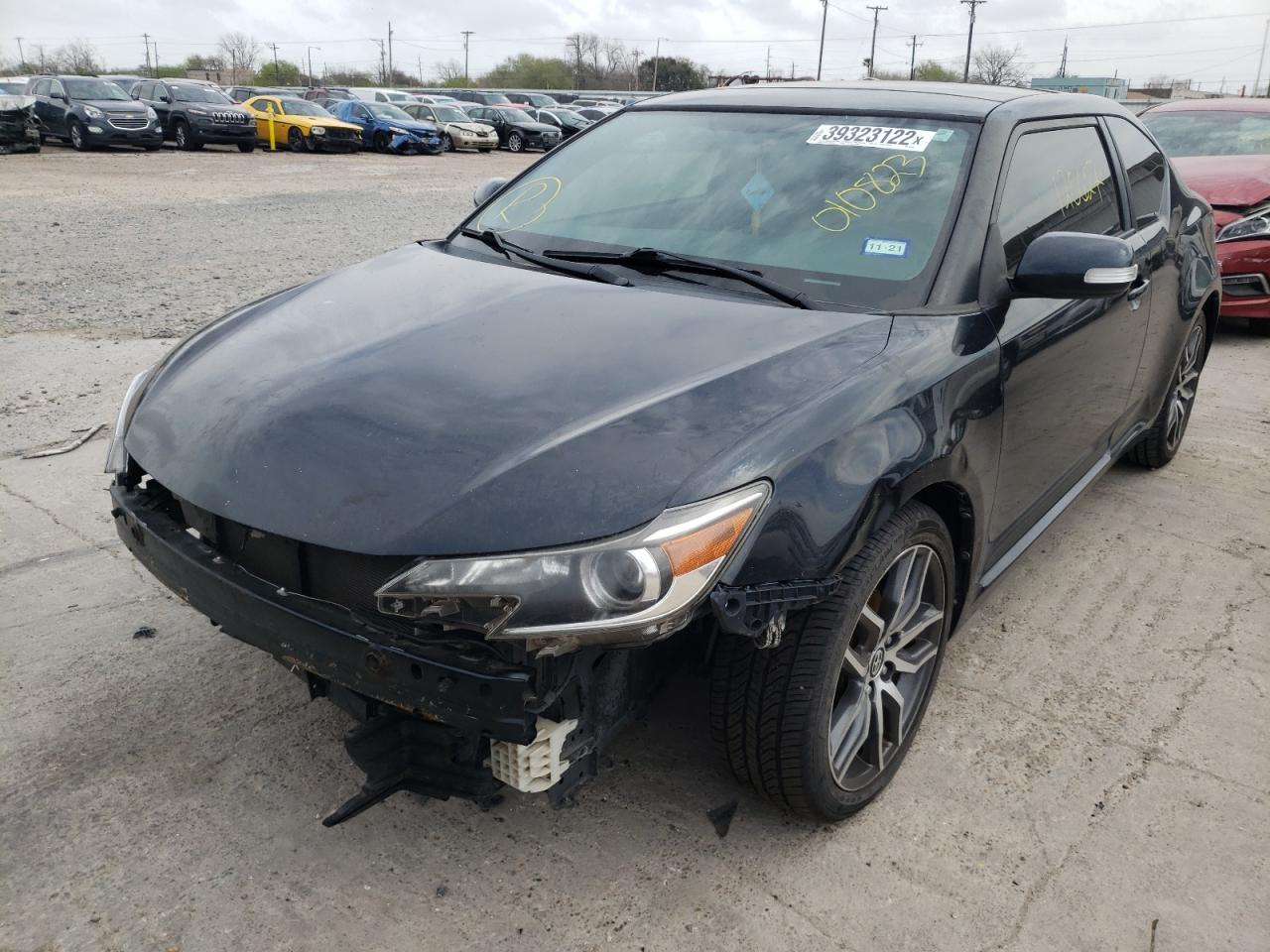 Photo 2 from auction – 2015 TOYOTA SCION TC with VIN JTKJF5C79FJ010823