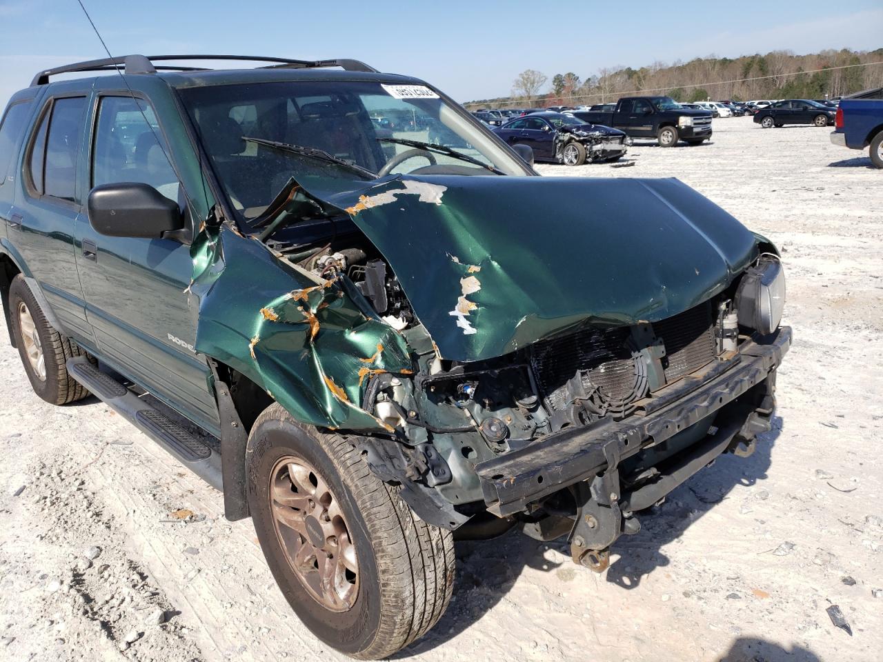 Photo 9 from auction – 2002 ISUZU RODEO S with VIN 4S2CK58W724300079