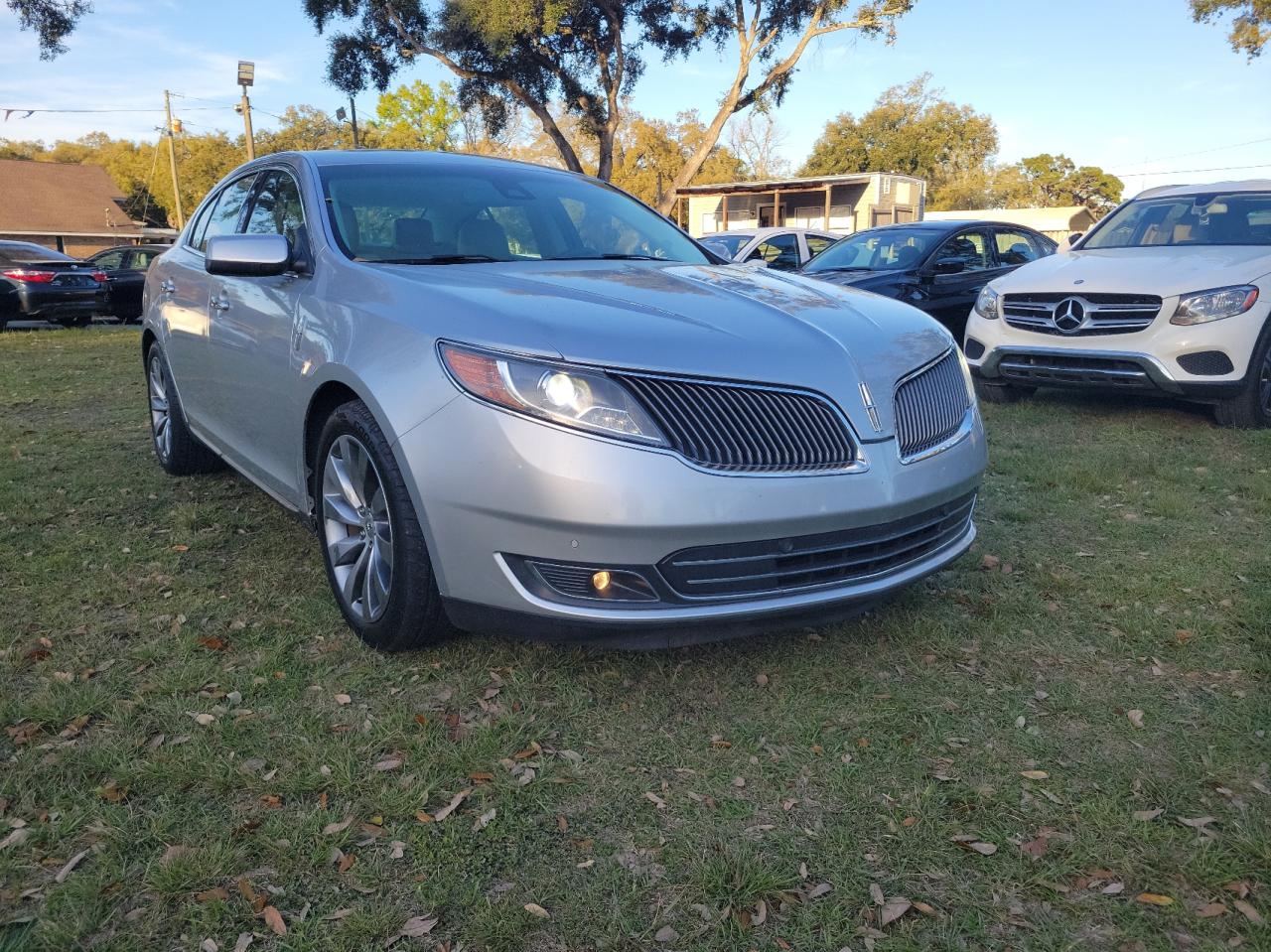 LINCOLN MKS 2013 with VIN 1LNHL9DK0DG612752 - Photo from auction