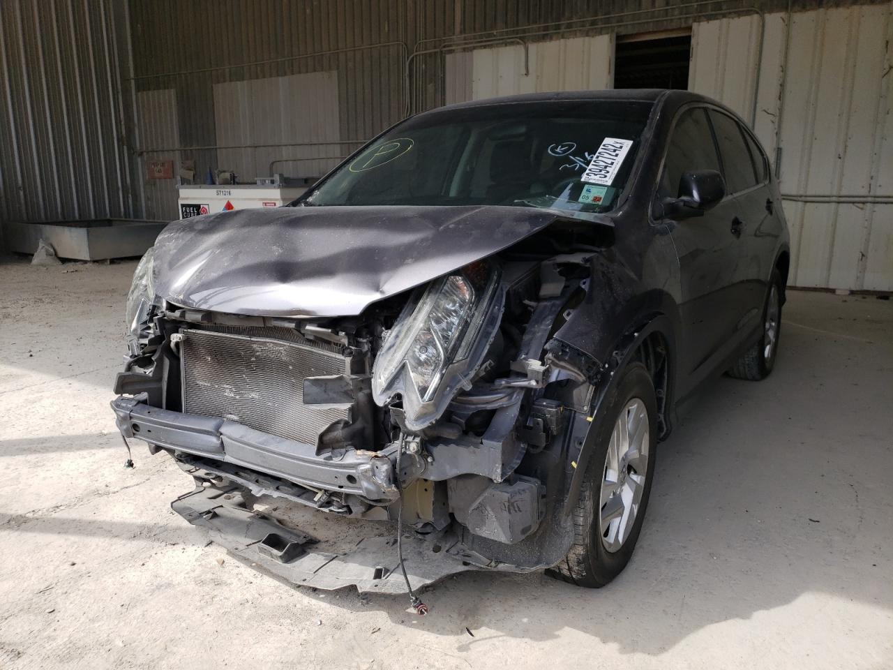 Photo 2 from auction – 2015 HONDA CR-V EX with VIN 3CZRM3H55FG712175