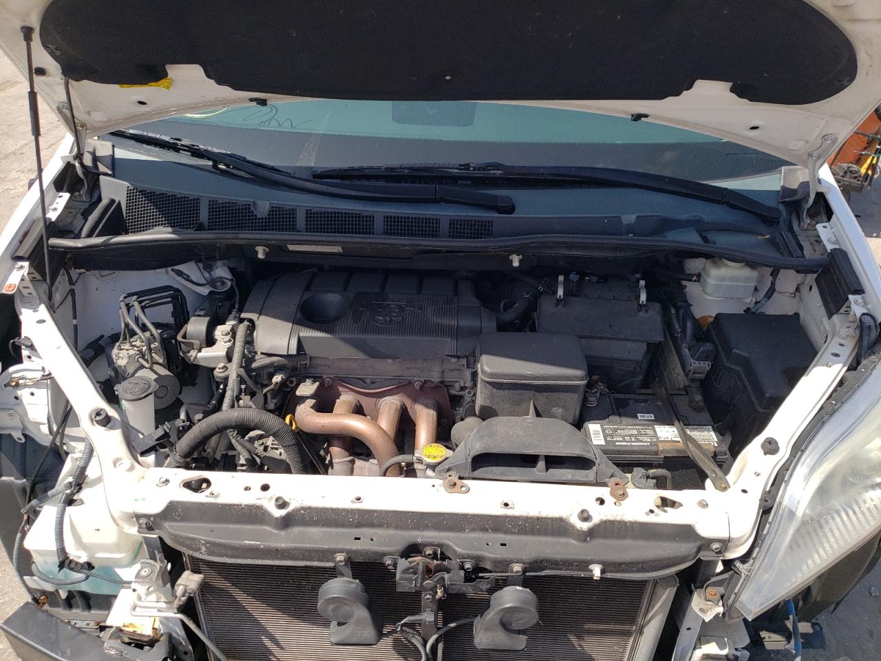 Photo 7 from auction – 2012 TOYOTA SIENNA BAS with VIN 5TDKA3DC1CS011926