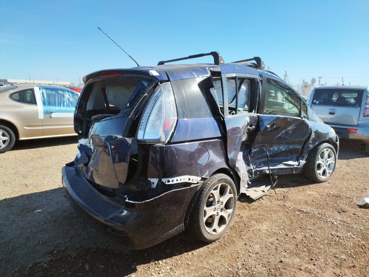 Photo 4 from auction – 2009 MAZDA 5 with VIN JM1CR293590342634