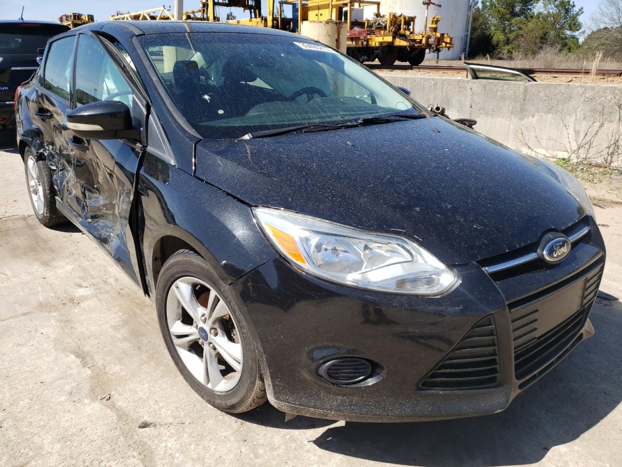 FORD FOCUS SE 2014 with VIN 1FADP3F21EL416349 - Photo from auction