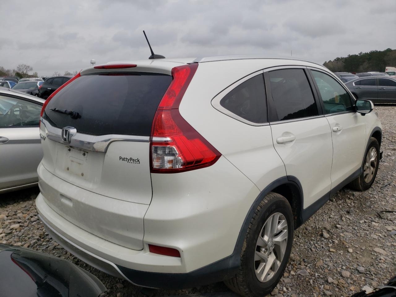 Photo 4 from auction – 2015 HONDA CR-V EXL with VIN 5J6RM3H78FL008234