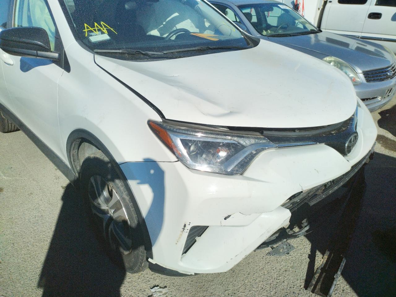 Photo 9 from auction – 2017 TOYOTA RAV4 LE with VIN JTMZFREV0HJ130073