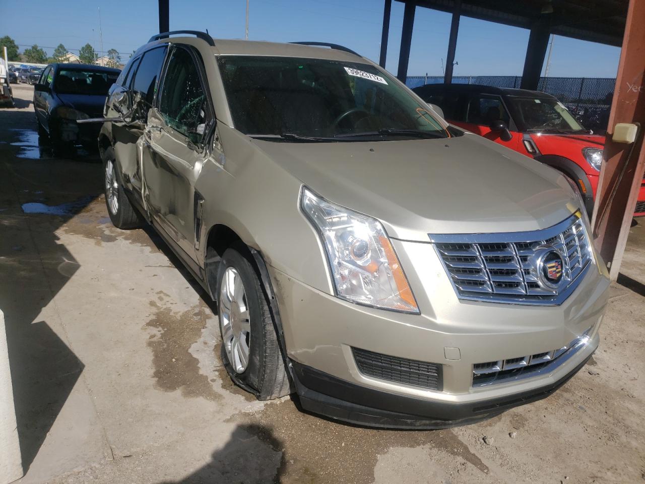 CADILLAC SRX 2014 with VIN 3GYFNAE31ES670817 - Photo from auction