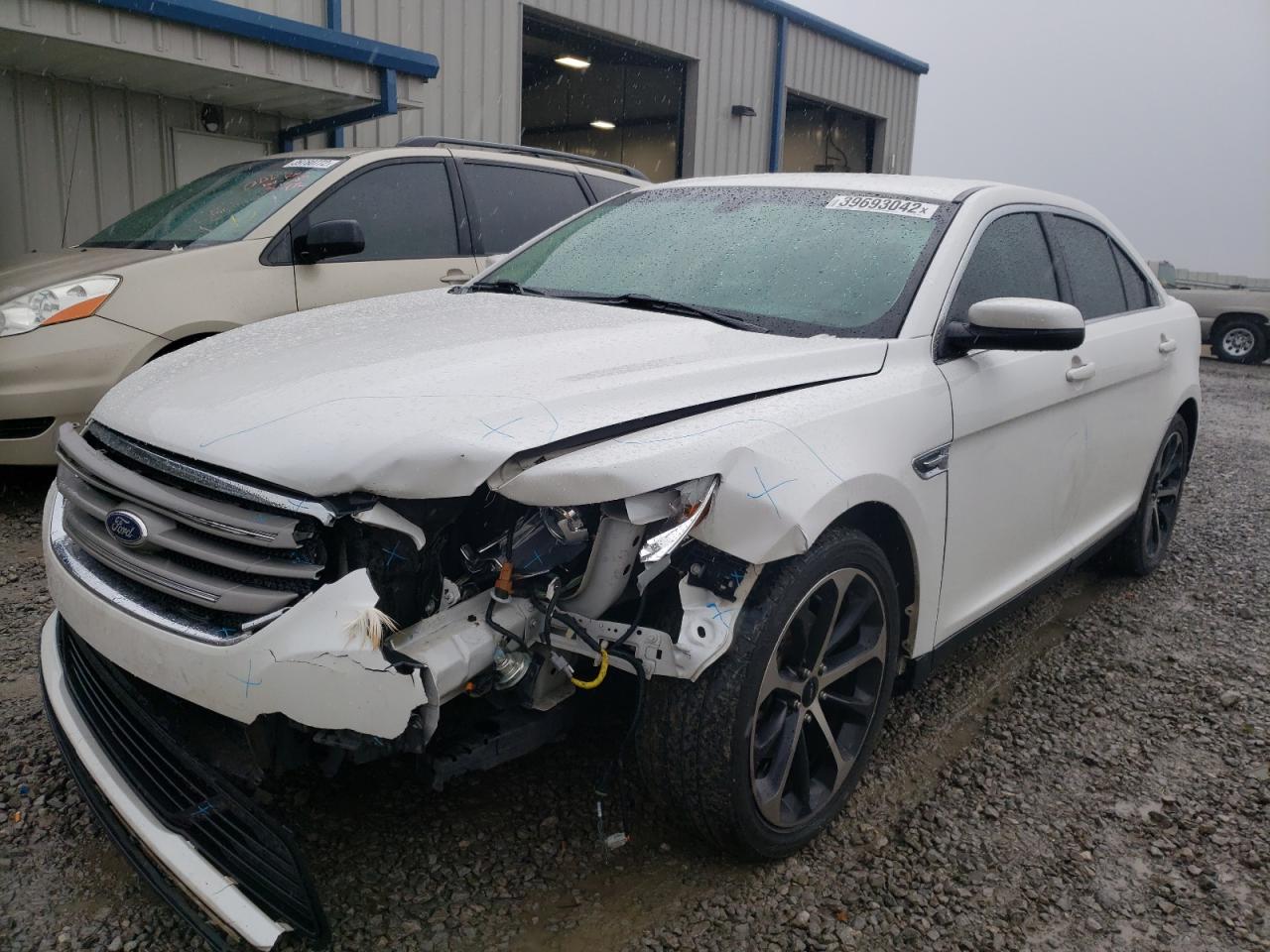 Photo 2 from auction – 2014 FORD TAURUS SEL with VIN 1FAHP2E8XEG107991