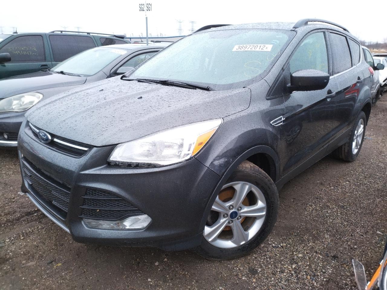 Photo 2 from auction – 2016 FORD ESCAPE SE with VIN 1FMCU0GX3GUA61877