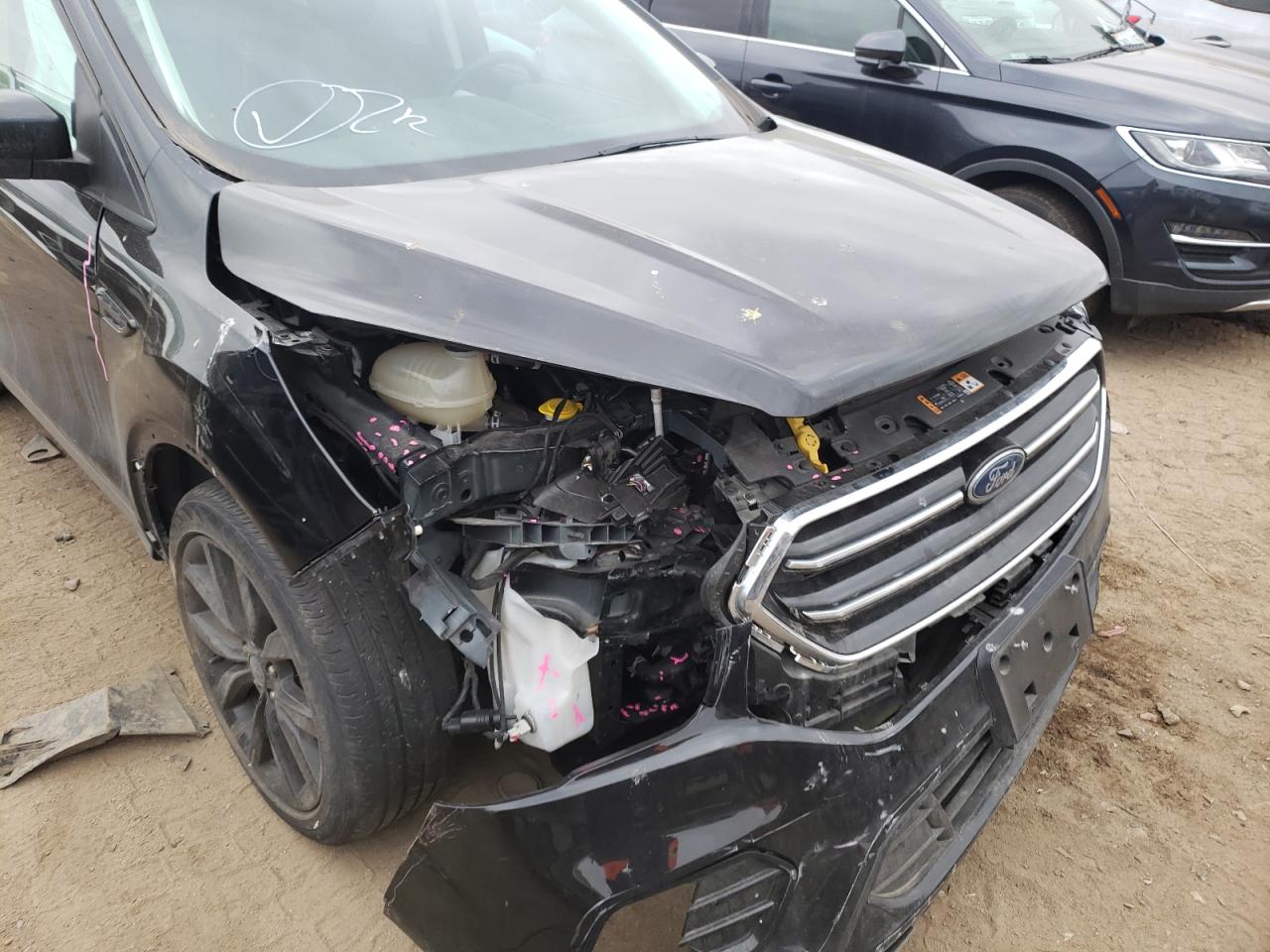 Photo 9 from auction – 2019 FORD ESCAPE SE with VIN 1FMCU9GD3KUA35122