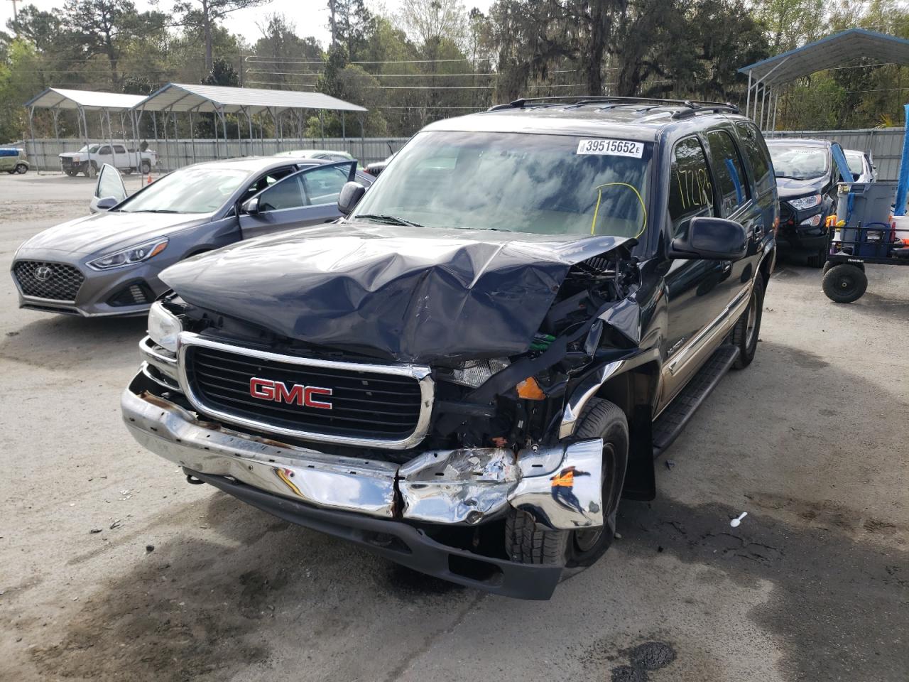 Photo 2 from auction – 2000 GMC YUKON with VIN 1GKEK13TXYJ140708