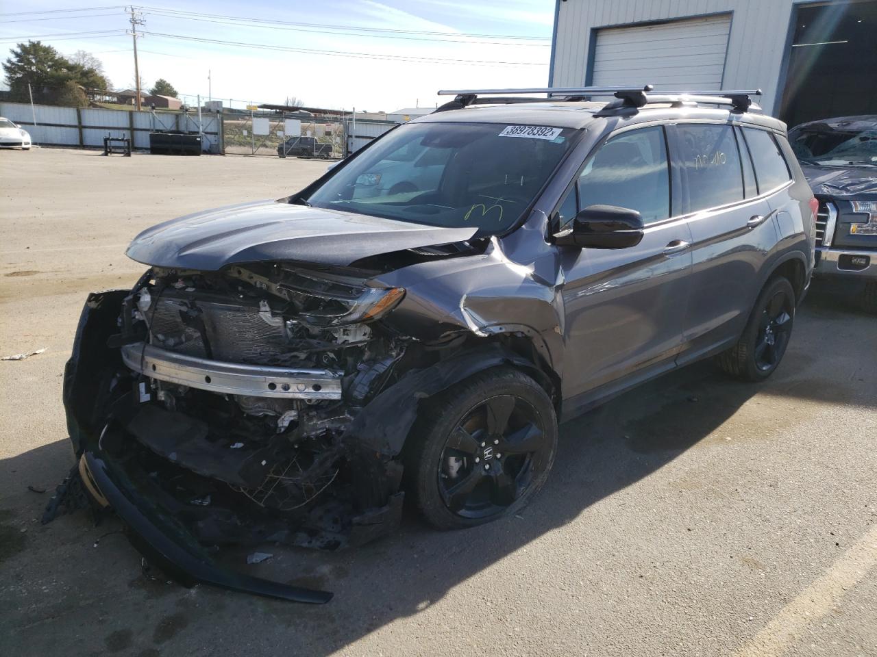 Photo 2 from auction – 2020 HONDA PASSPORT E with VIN 5FNYF8H02LB014184