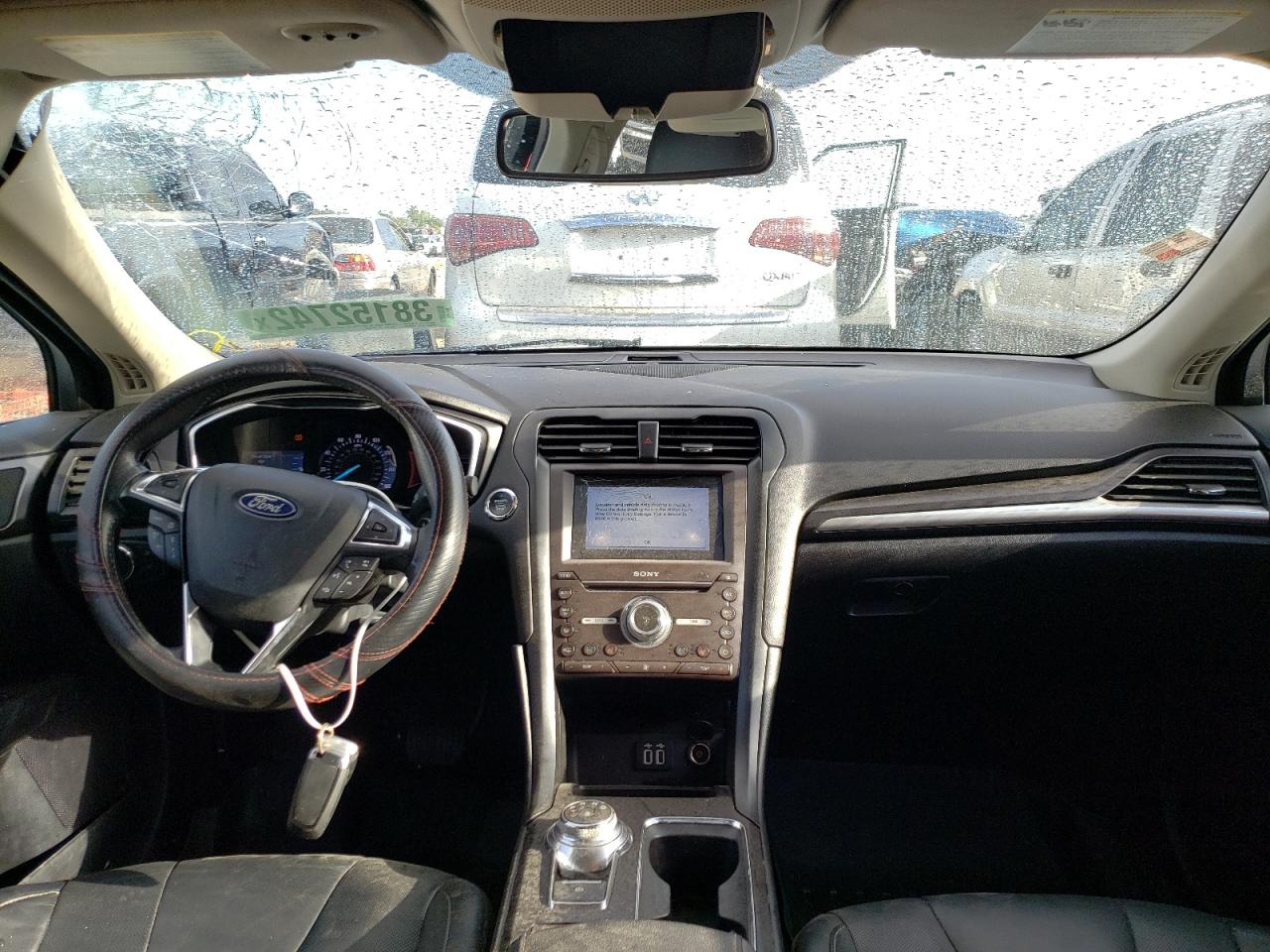 Photo 9 from auction – 2019 FORD FUSION TIT with VIN 3FA6P0D90KR143277