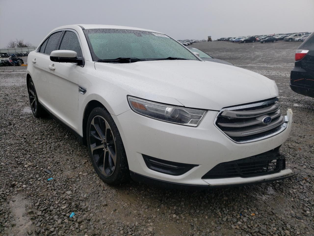 FORD TAURUS SEL 2014 with VIN 1FAHP2E8XEG107991 - Photo from auction