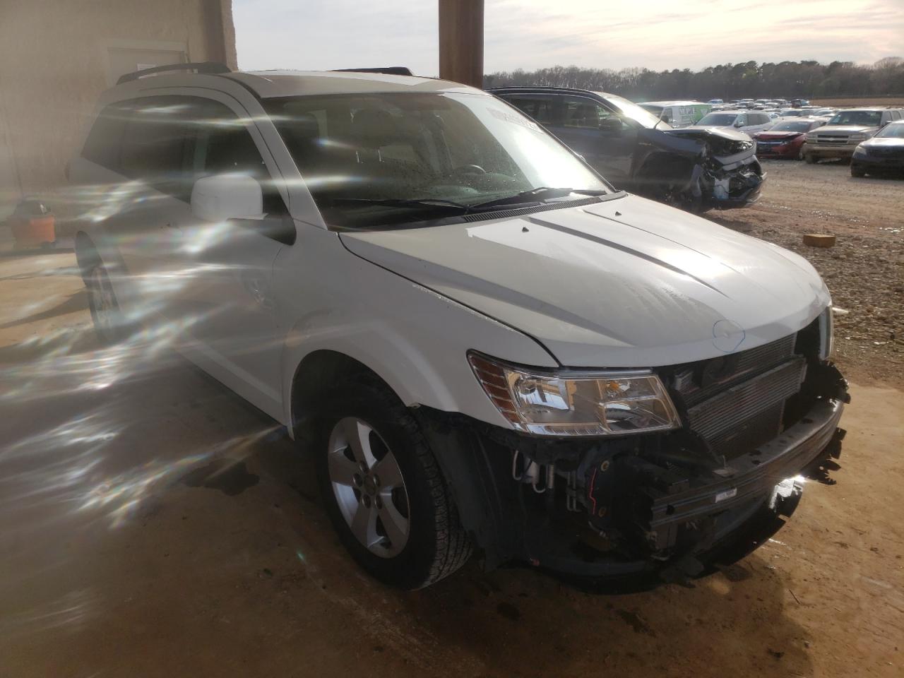DODGE JOURNEY SX 2012 with VIN 3C4PDCBG9CT142904 - Photo from auction