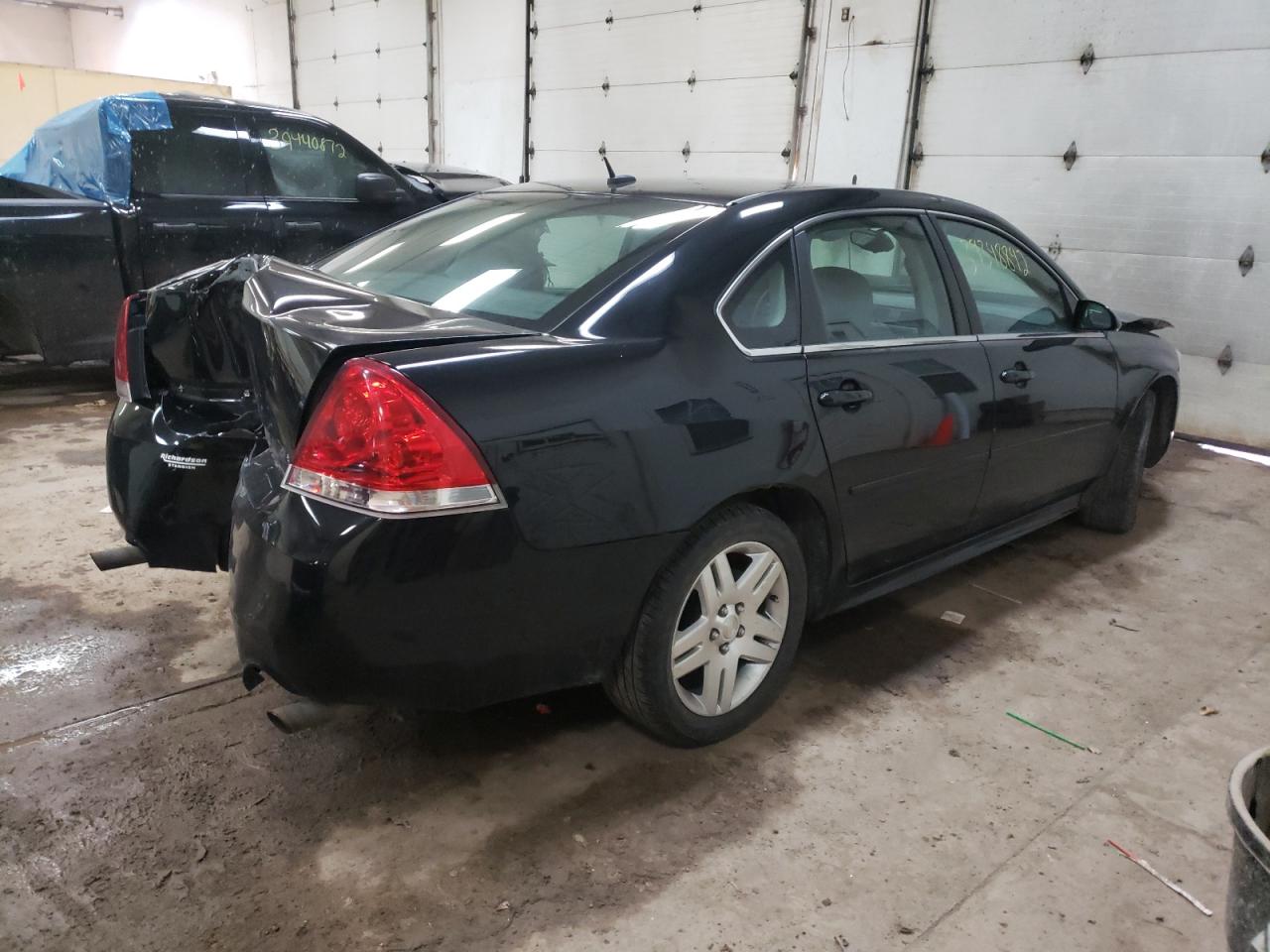 Photo 4 from auction – 2014 CHEVROLET IMPALA LIM with VIN 2G1WB5E33E1123459