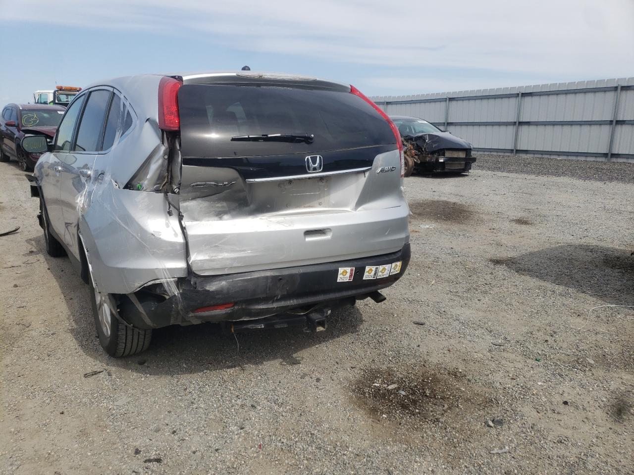Photo 9 from auction – 2014 HONDA CR-V EX with VIN 2HKRM4H57EH634953