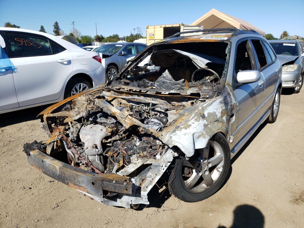 Photo 2 from auction – 2003 MAZDA PROTEGE PR with VIN JM1BJ246631208074