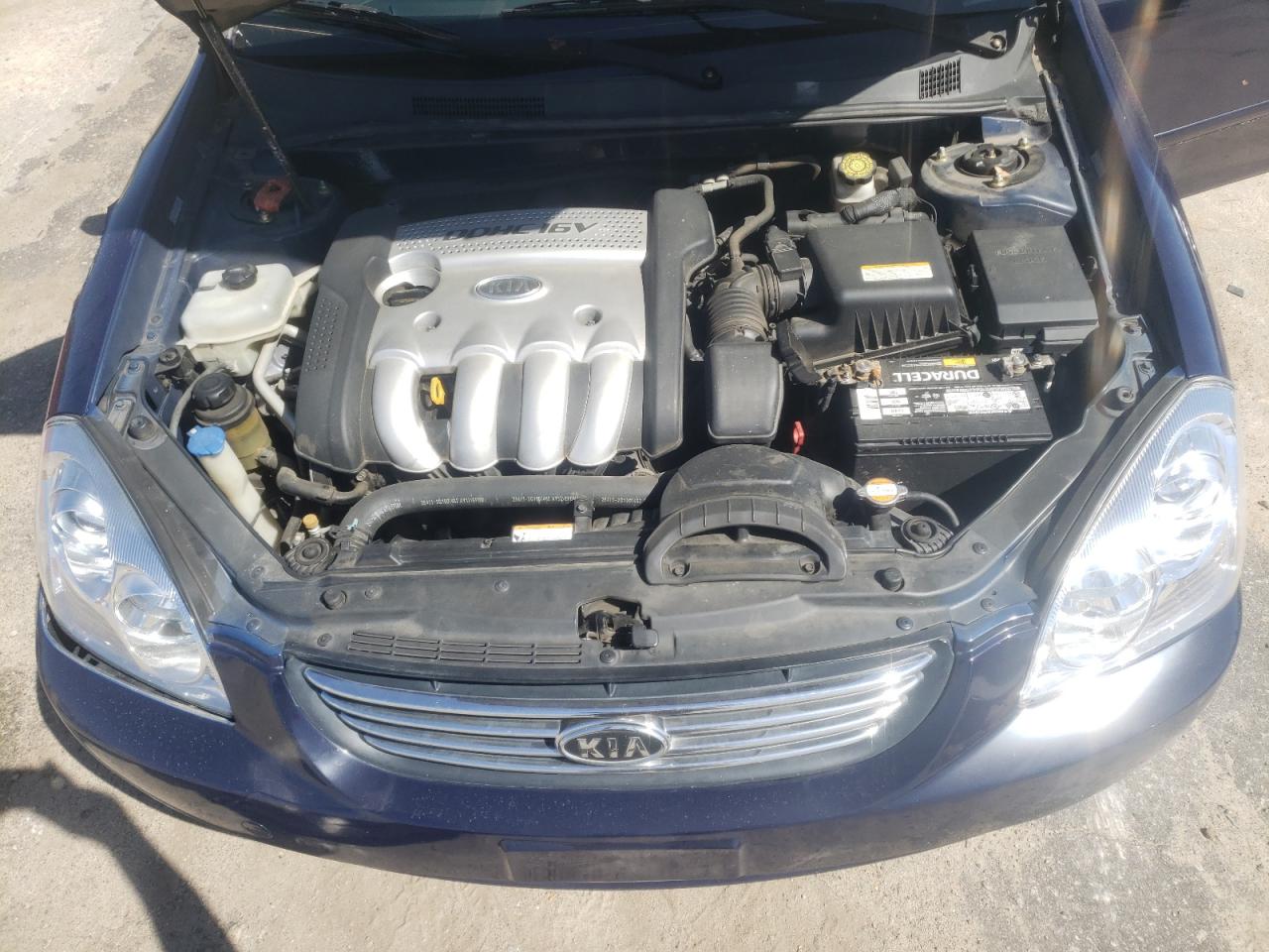 Photo 7 from auction – 2006 KIA OPTIMA LX with VIN KNAGE123765067247