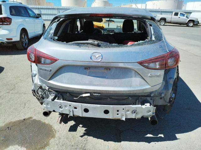 Photo 9 from auction – 2014 MAZDA 3 TOURING with VIN JM1BM1L72E1101201