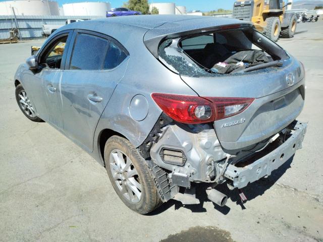 Photo 3 from auction – 2014 MAZDA 3 TOURING with VIN JM1BM1L72E1101201