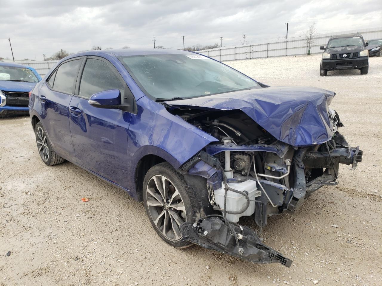 TOYOTA COROLLA L 2017 with VIN 5YFBURHE1HP585903 - Photo from auction