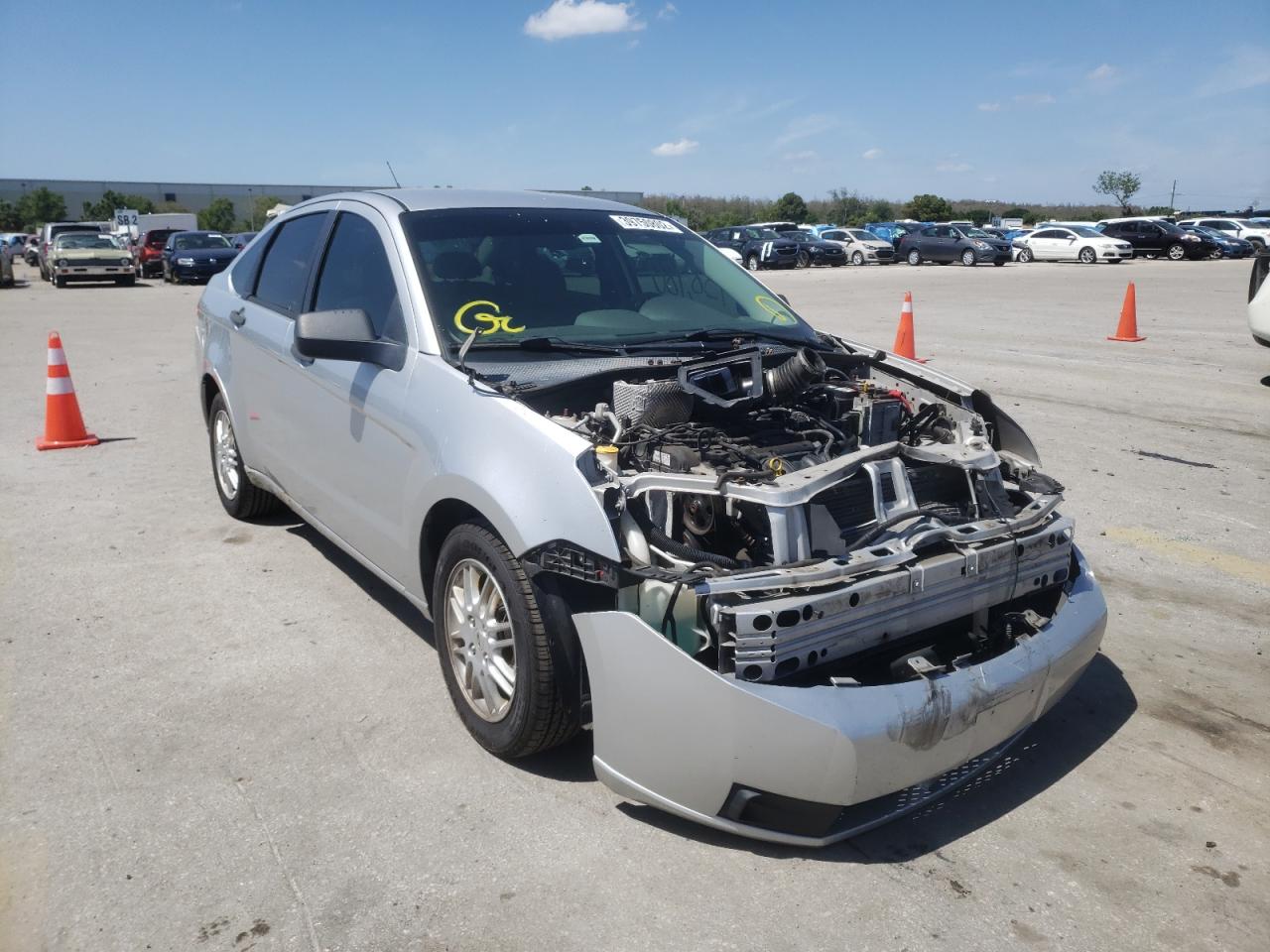 FORD FOCUS SE 2011 with VIN 1FAHP3FN7BW125599 - Photo from auction
