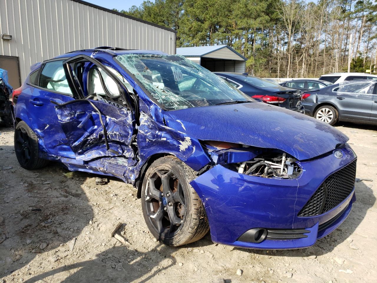 FORD FOCUS ST 2013 with VIN 1FADP3L9XDL282893 - Photo from auction