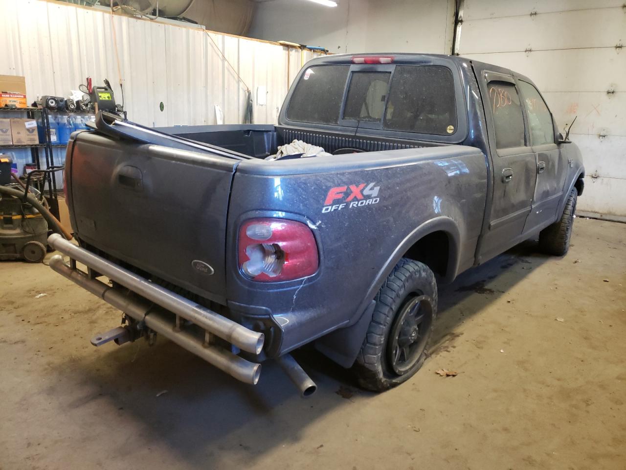 Photo 4 from auction – 2003 FORD F150 SUPER with VIN 1FTRW08683KD53948