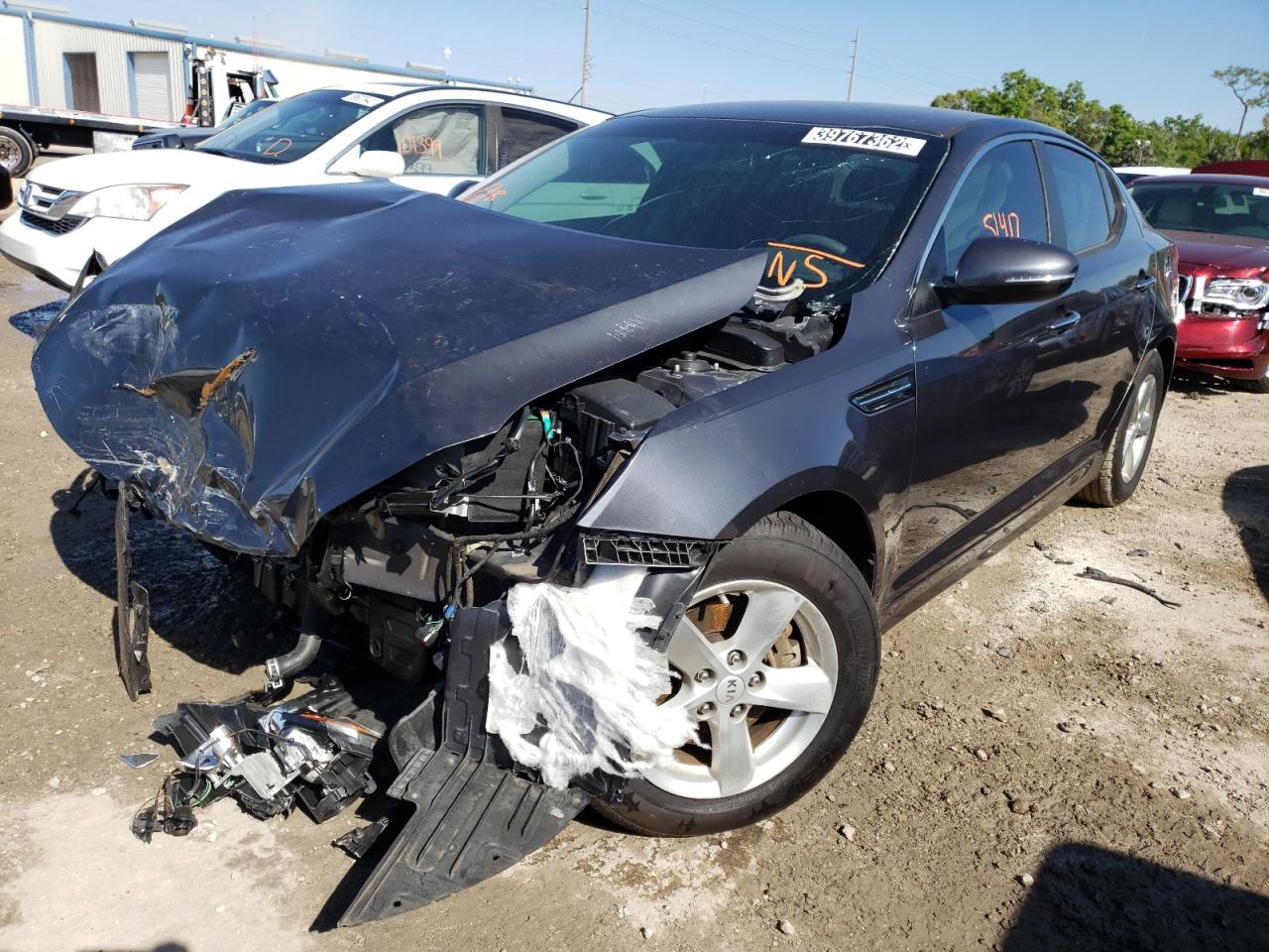 Photo 15 from auction – 2015 KIA OPTIMA LX with VIN KNAGM4A71F5649286