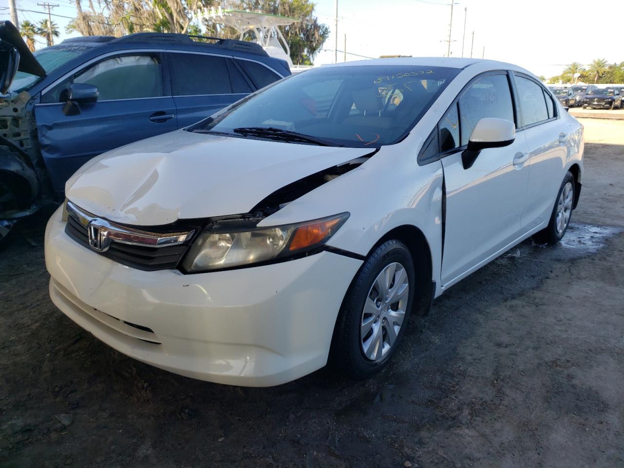 Photo 2 from auction – 2012 HONDA CIVIC LX with VIN 19XFB2F55CE008108