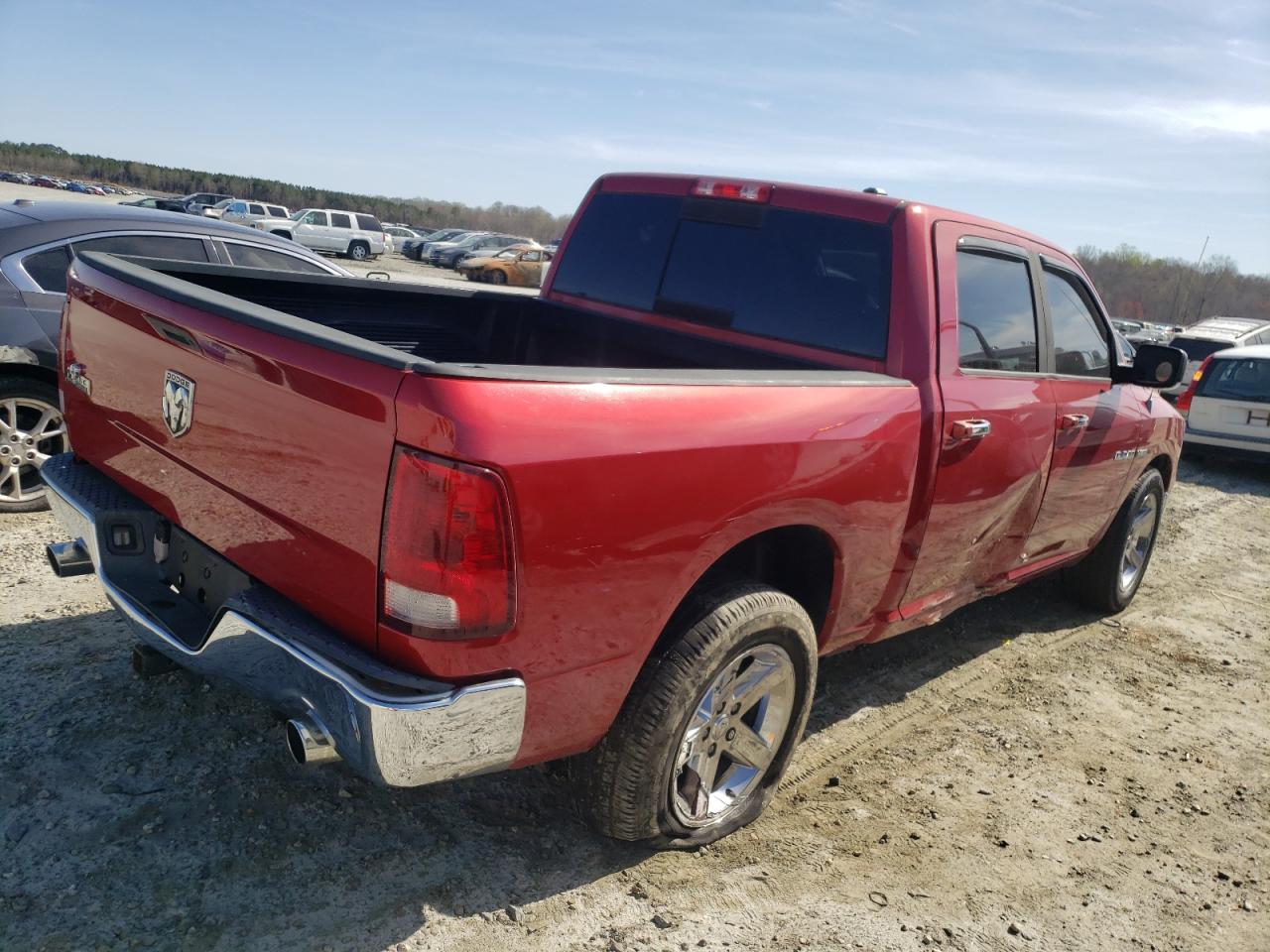 Photo 4 from auction – 2010 DODGE RAM 1500 with VIN 1D7RB1CT5AS107716
