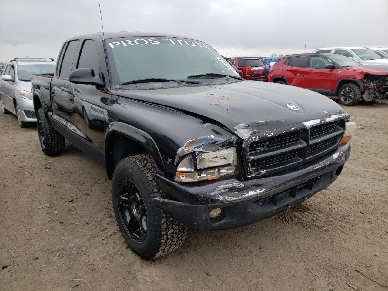 DODGE DAKOTA QUA 2000 with VIN 1B7GG2AN3YS752680 - Photo from auction