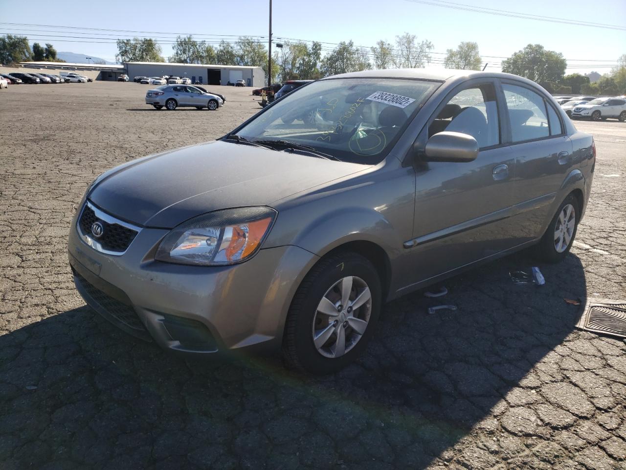 Photo 2 from auction – 2011 KIA RIO BASE with VIN KNADH4A32B6949914