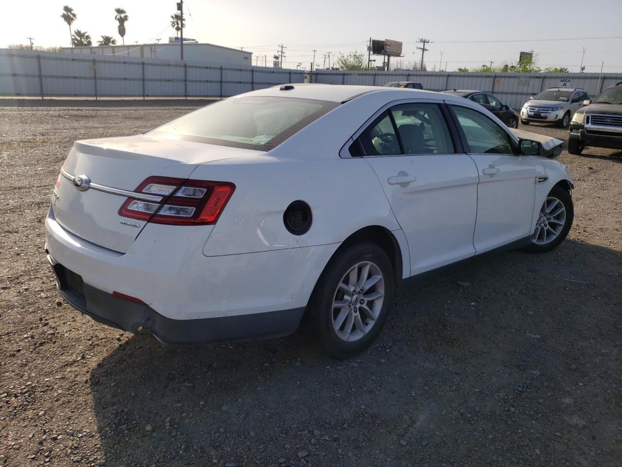 Photo 4 from auction – 2015 FORD TAURUS SE with VIN 1FAHP2D86FG123950