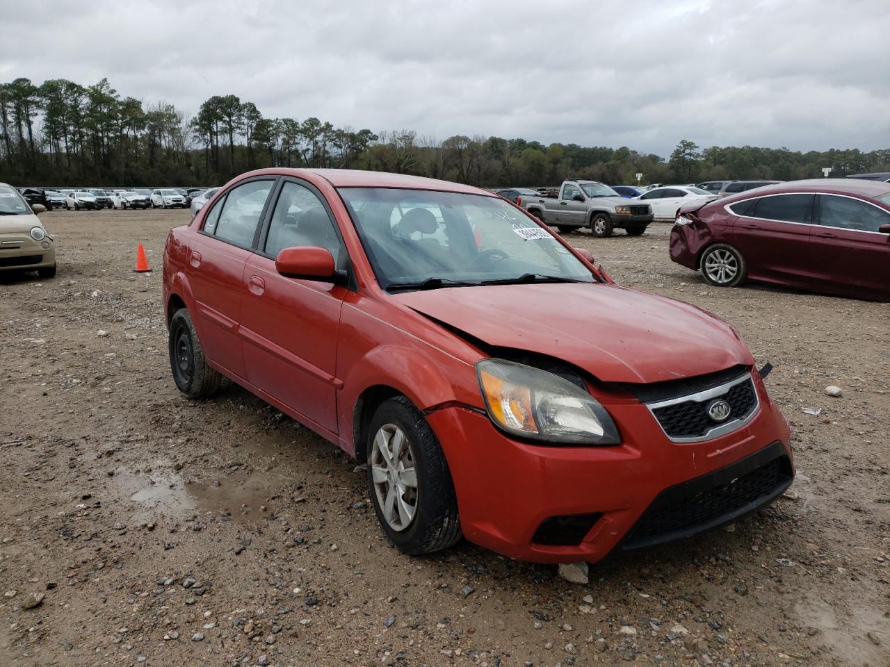 KIA RIO 2010 with VIN KNADH4A32A6614893 - Photo from auction