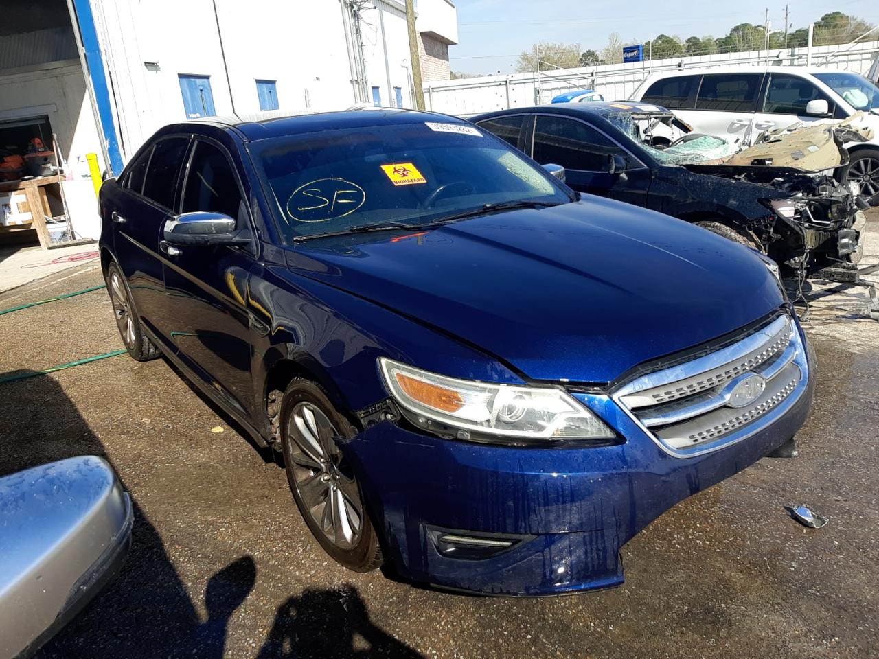 FORD TAURUS 2011 with VIN 1FAHP2FW3BG158435 - Photo from auction