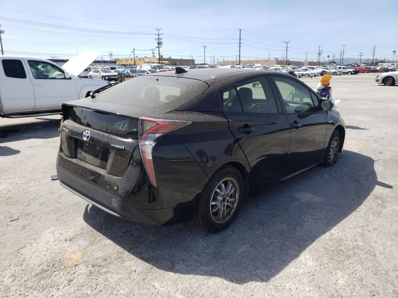 Photo 4 from auction – 2016 TOYOTA PRIUS with VIN JTDKBRFUXG3512262