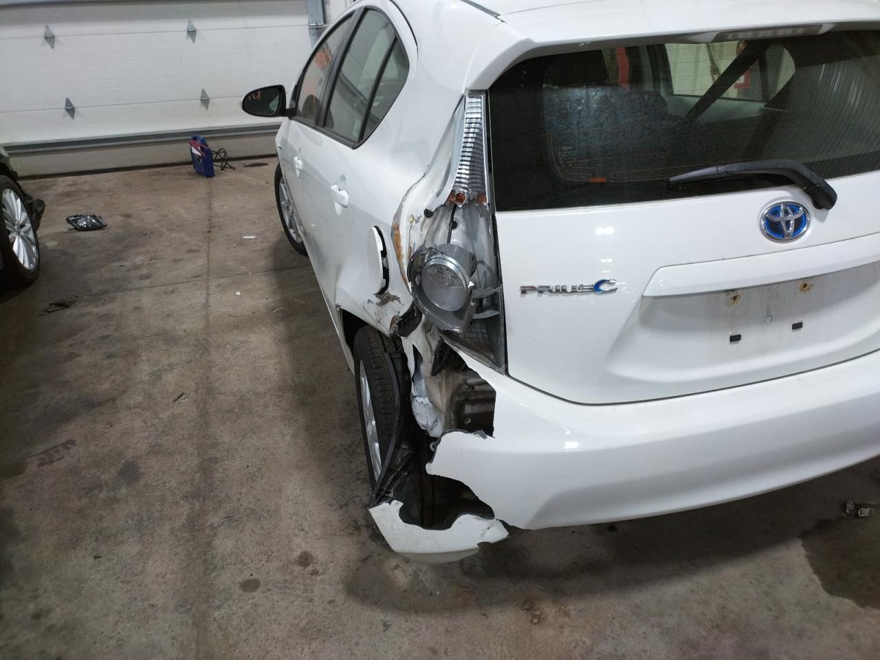 Photo 9 from auction – 2012 TOYOTA PRIUS C with VIN JTDKDTB38C1514084