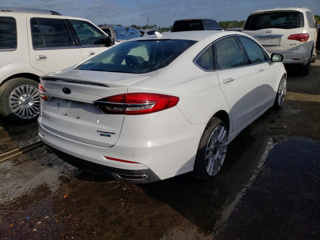 Photo 4 from auction – 2019 FORD FUSION TIT with VIN 3FA6P0D90KR143277
