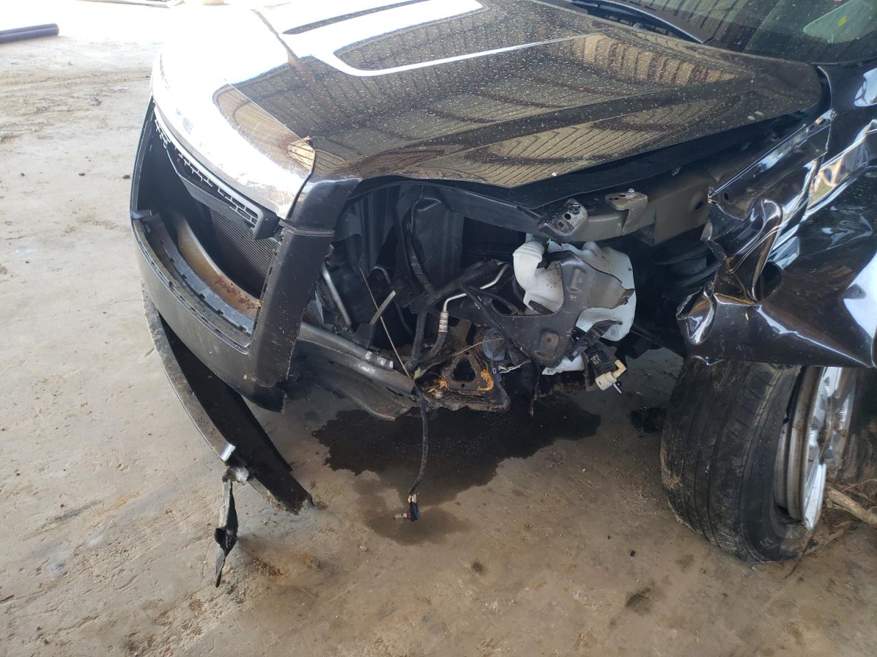 Photo 9 from auction – 2014 GMC TERRAIN SL with VIN 2GKFLWE35E6195636