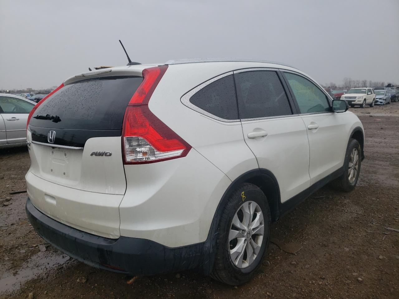 Photo 4 from auction – 2013 HONDA CRV with VIN 5J6RM4H70DL064963