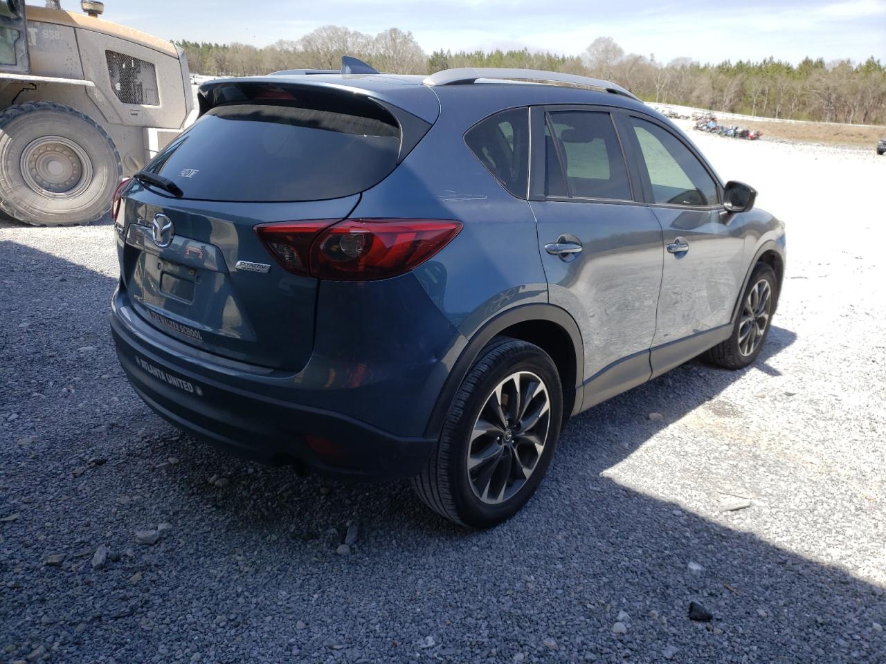 Photo 4 from auction – 2016 MAZDA CX-5 GT with VIN JM3KE2DY2G0605757